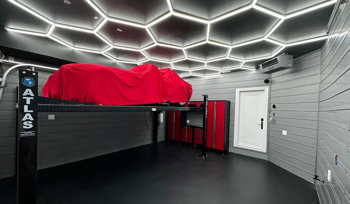 garage wall storage system keeping tools and equipment organized with LED HEX lights